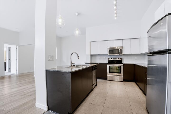 Property Photo:  13733 107A Avenue 523  BC V3T 0B7 
