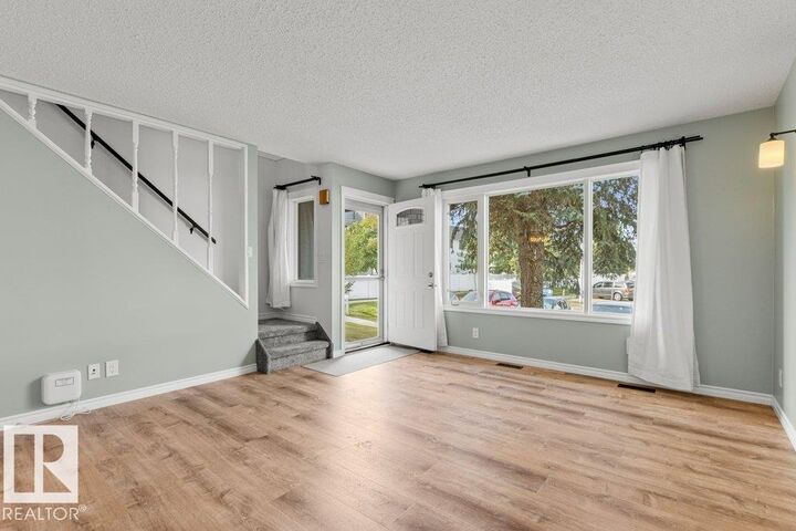 Property Photo:  11343 22 Avenue NW  AB T6J 4V8 