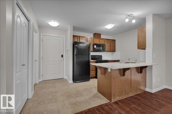 Property Photo:  271 Charlotte Way 319  AB T8H 0N9 
