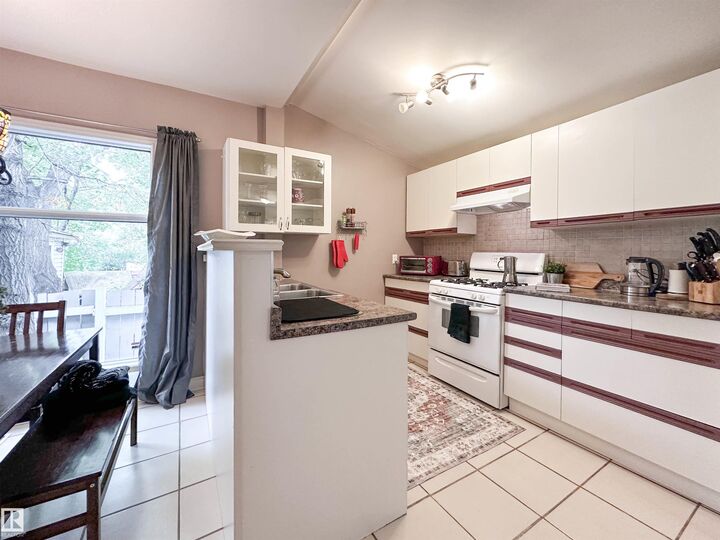 Property Photo:  11825 80 Street NW  AB T5B 2N6 