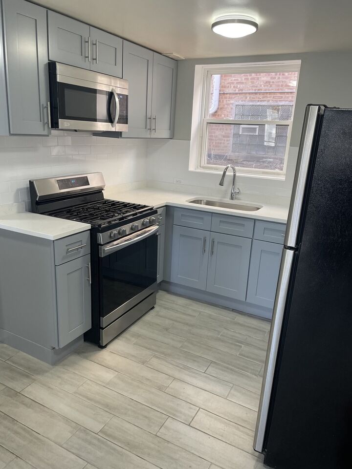 Property Photo:  5712 W Higgins Avenue Garden  IL 60630 