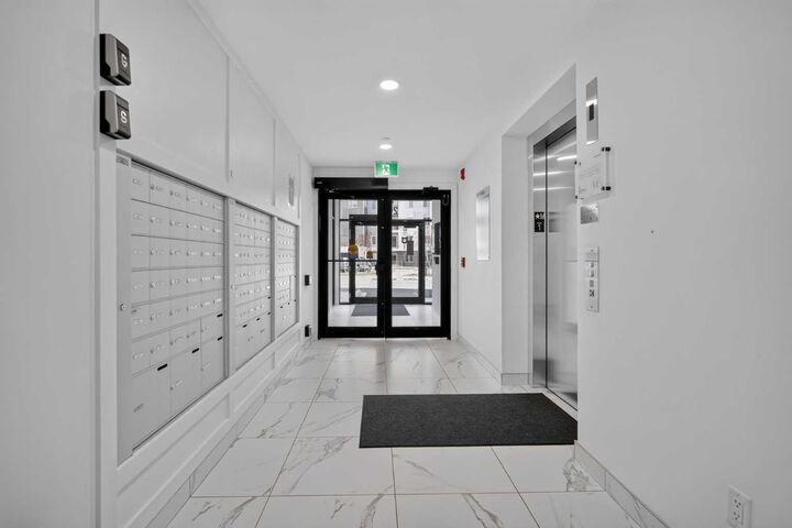 Property Photo:  265 Wolf Willow Boulevard SE 2120  AB T2X 6R1 