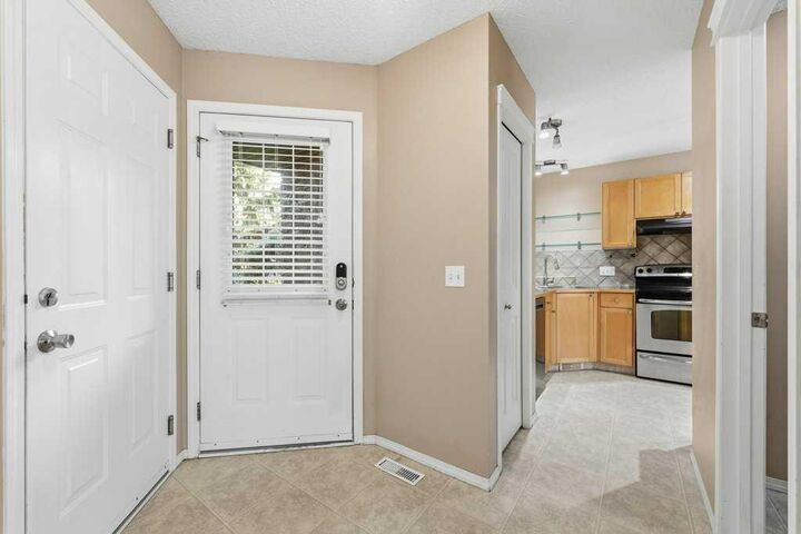 Property Photo:  140 Sagewood Boulevard SW 304  AB T4B 3H5 