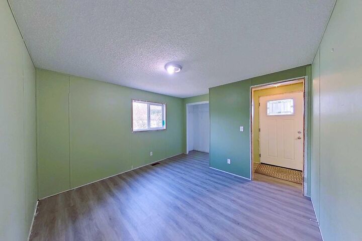 Property Photo:  1006 9 Avenue  AB T0G 2B0 