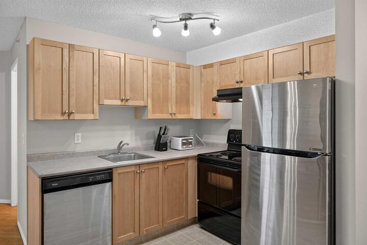 Property Photo:  2518 Fish Creek Boulevard SW 2307  AB T2Y 4T6 
