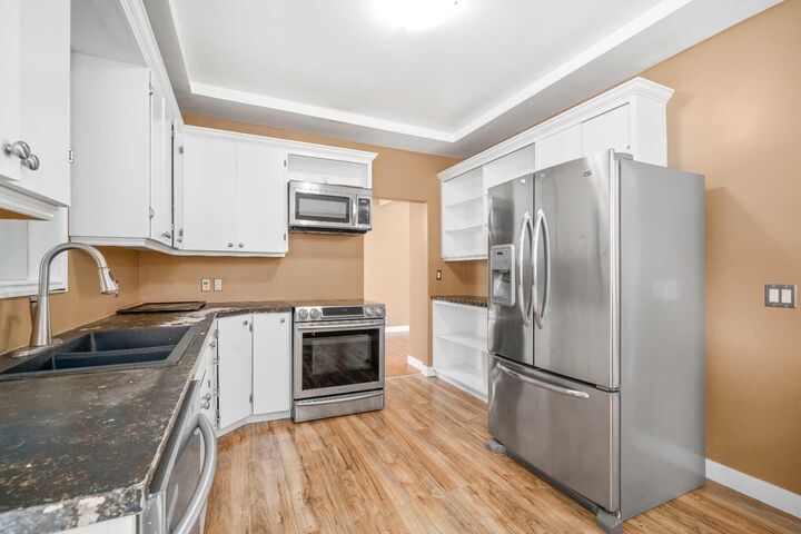 Property Photo:  227 4 Street SW  AB T1A 4E4 