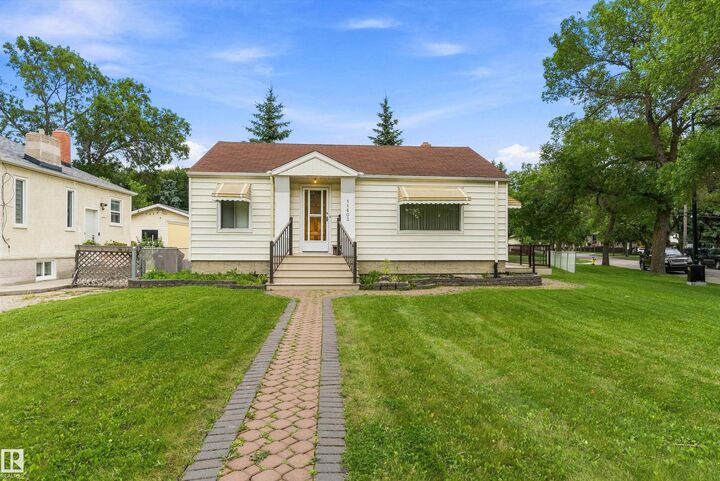 Property Photo:  11603 St Albert Trail NW  AB T5M 3L6 