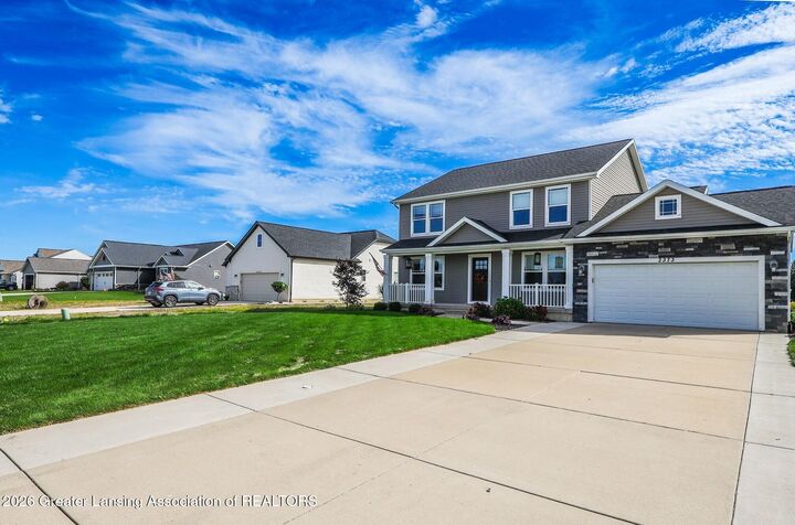 Property Photo:  2373 Winners Circle  MI 48879 