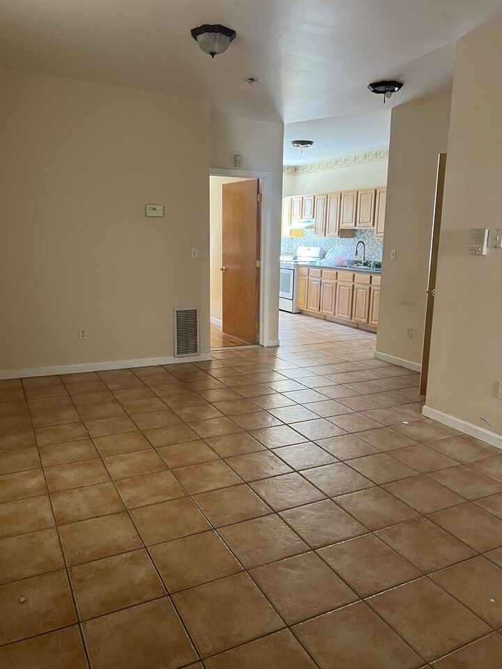 Property Photo:  1525 48th St 1  NJ 07047 