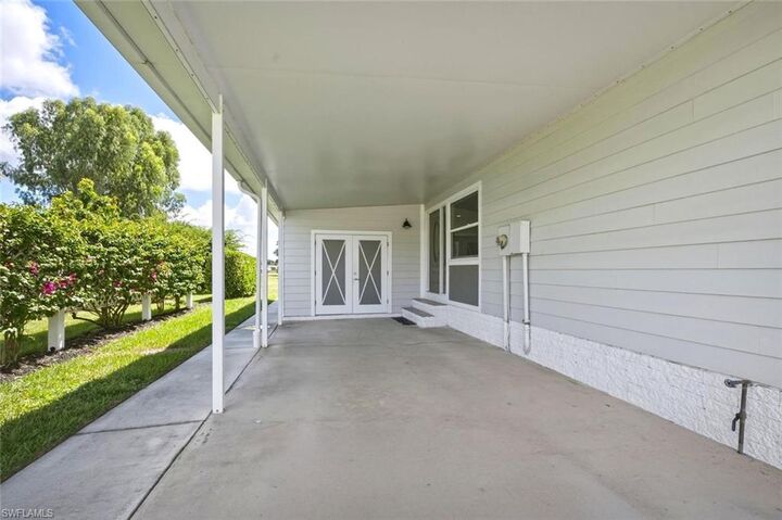 Property Photo:  50 Le Mans Dr  FL 34112 