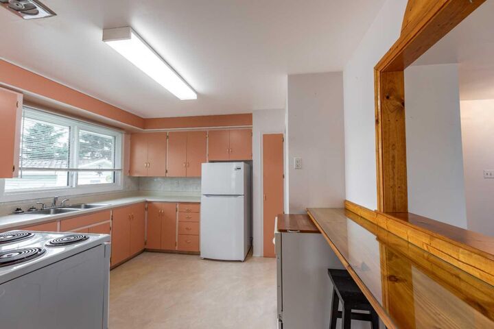 Property Photo: 104 Fraser Street AB T7V 1B7