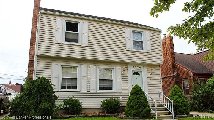 Property Photo:  1079 Riverbank Street  MI 48146 