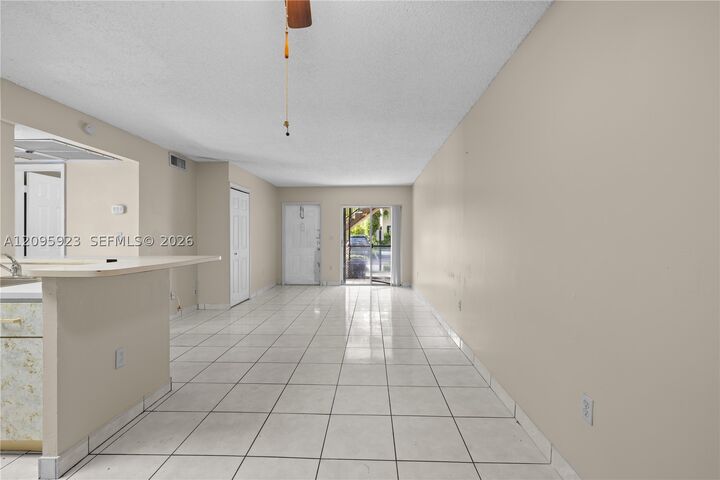 Property Photo:  15619 SW 73rd Cir Ter 10-9  FL 33193 