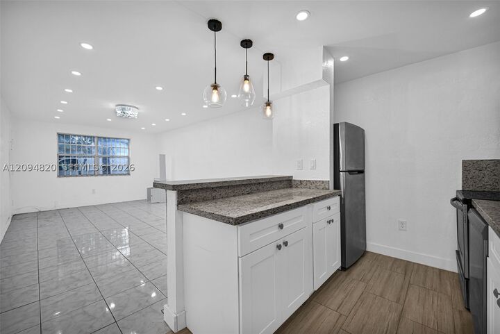 Property Photo:  13101 Memorial Hwy 104  FL 33161 
