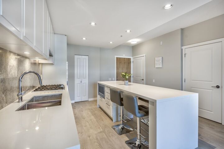 Property Photo:  3188 Riverwalk Avenue 409  BC V5S 0E7 