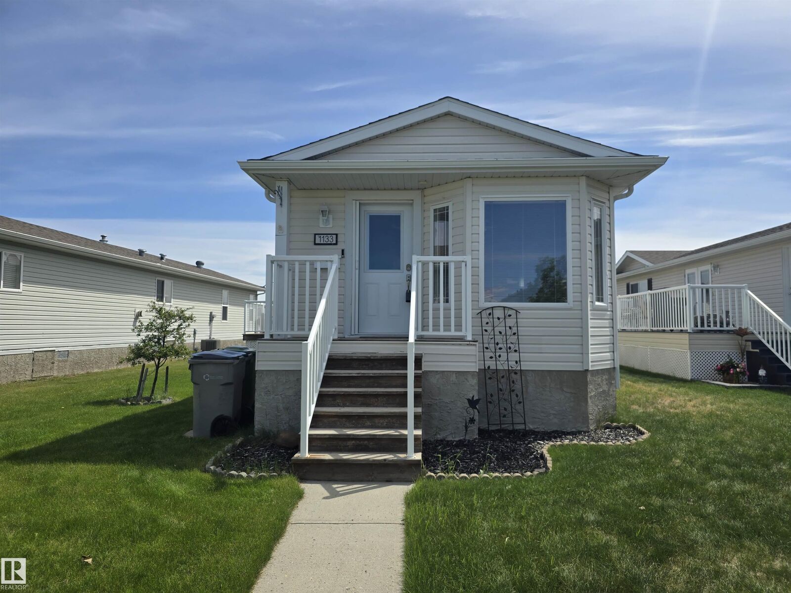 Property Photo:  1133 Aspen Drive  AB T9E 8R2 