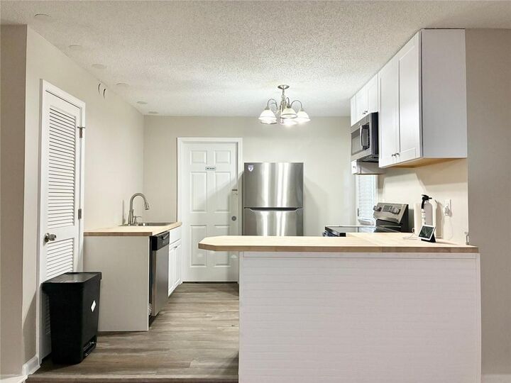 Property Photo:  4984 Galleon Crossing B  GA 30035 