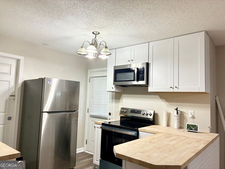 Property Photo:  4984 Galleon Crossing B  GA 30035 
