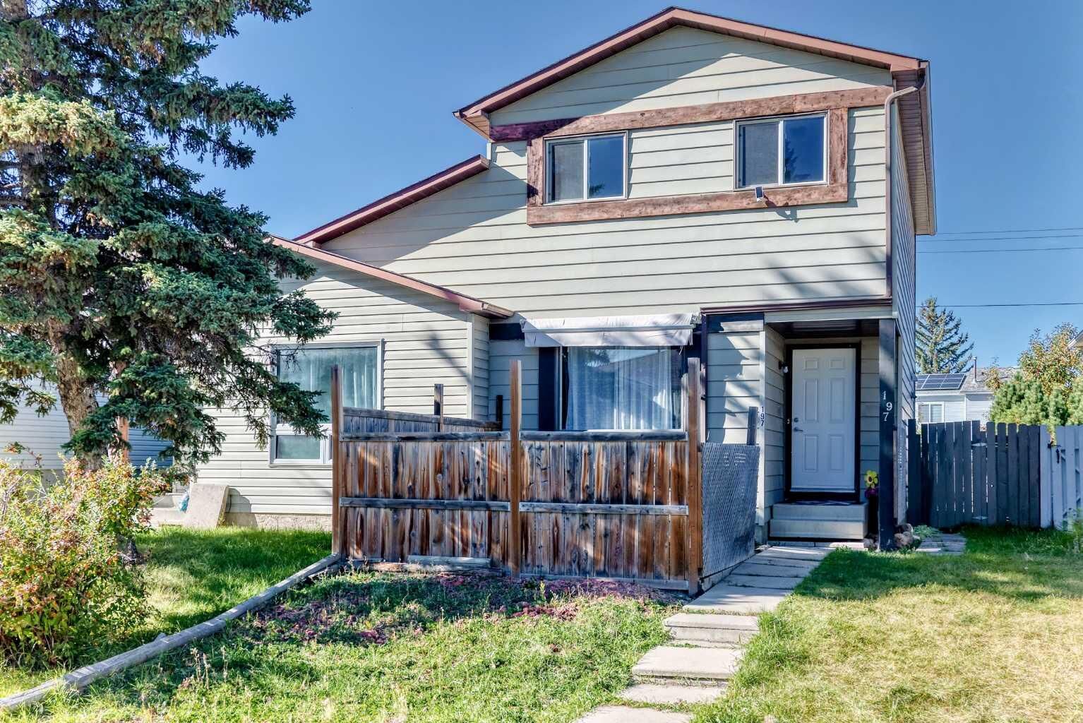 Property Photo:  197 Cedardale Road SW  AB T2W 5A8 