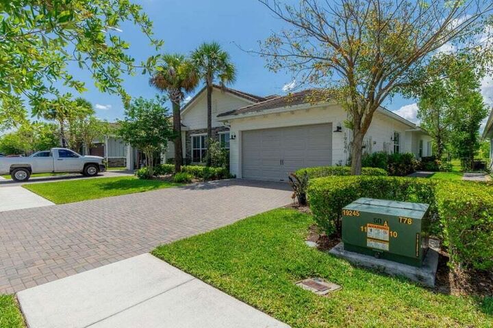 Property Photo:  19546 Weathervane Way  FL 33470 
