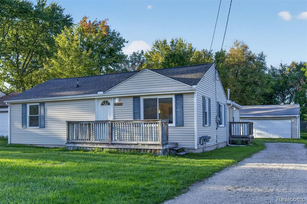 Property Photo:  5465 Raymond Avenue  MI 48509 
