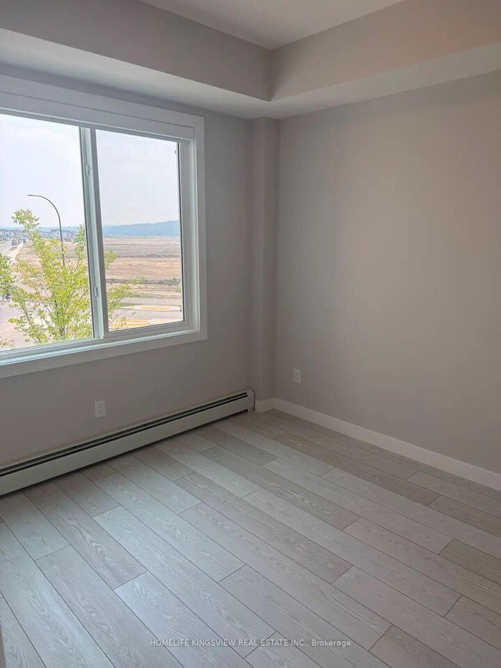 Property Photo:  265 Wolf Willow Boulevard S 3206  AB T2X 3Z8 