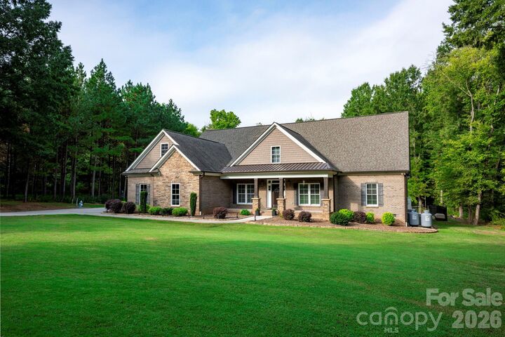 Property Photo:  5923 Rocky River Road N  NC 28079 