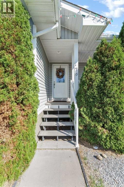 Property Photo:  78 Sunset Crescent Southwest  AB T1B 4T7 