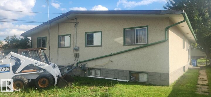 Property Photo:  4618B 45 Avenue  AB T9A 1Z7 