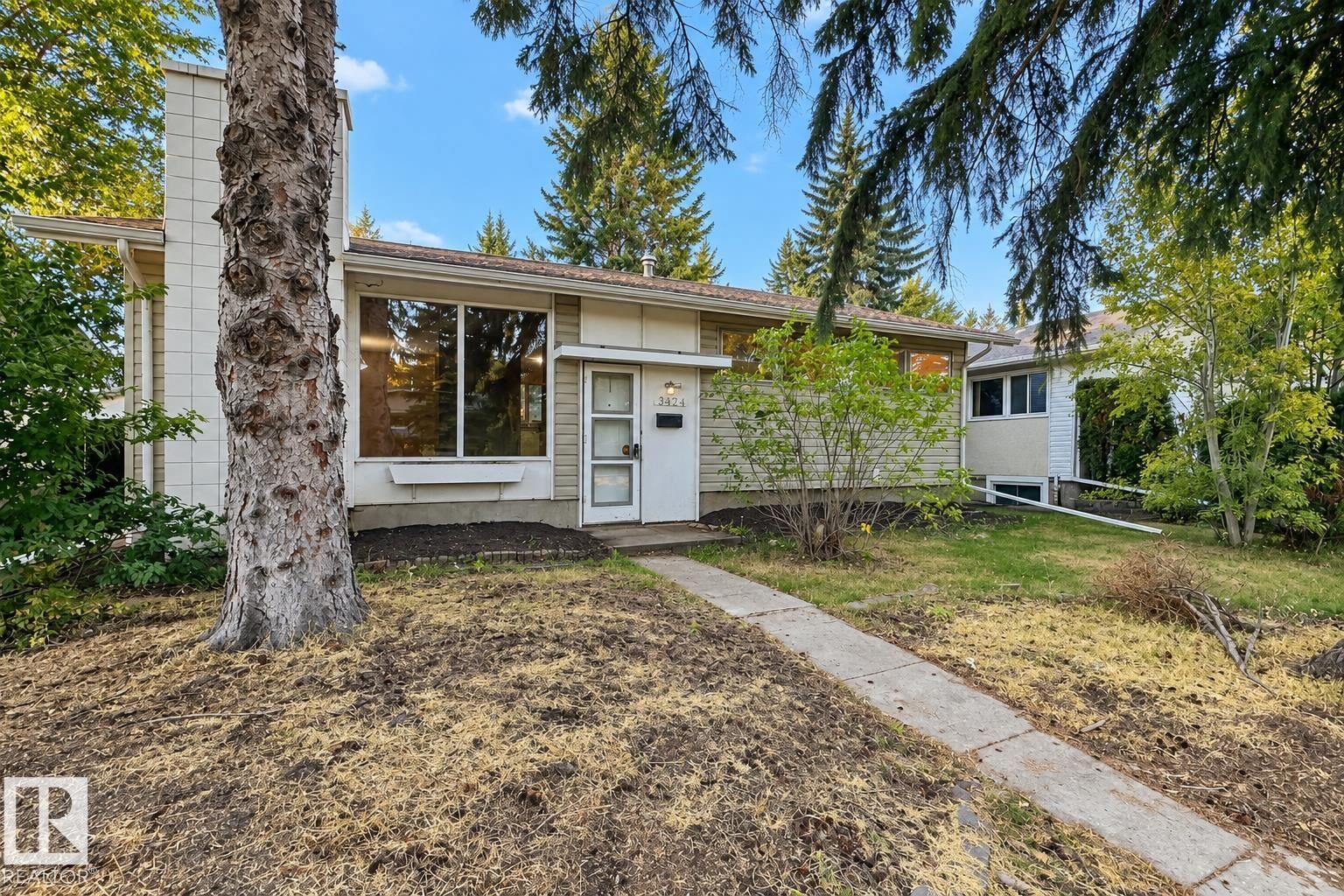 Property Photo: 12204 40 Avenue NW AB T6J 0S5