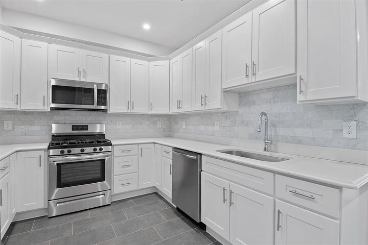 Property Photo: 311-315 West Side Ave 106 NJ 07305