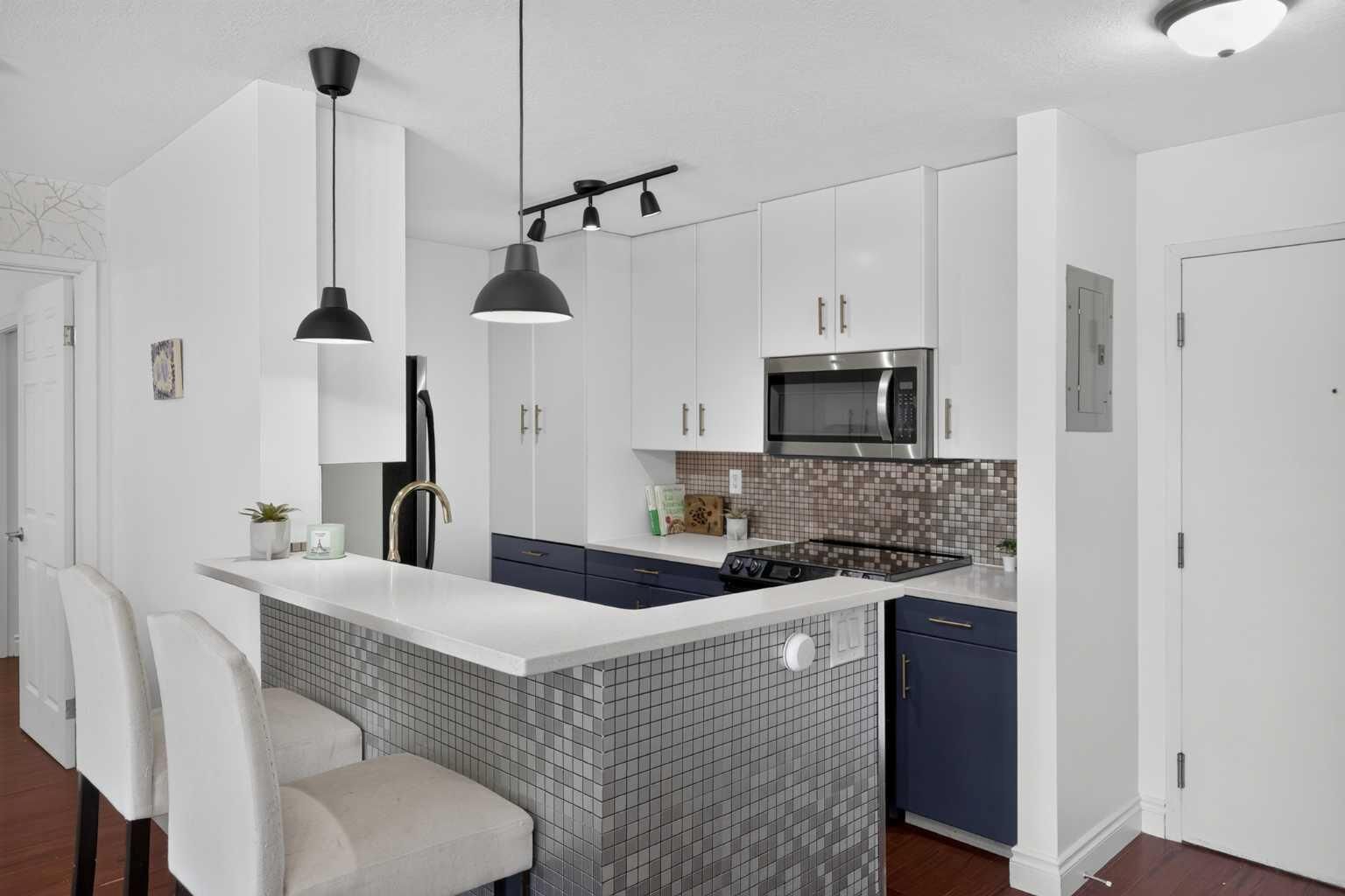 Property Photo:  27 Grier Place NE 5208  AB T2K 5Y5 