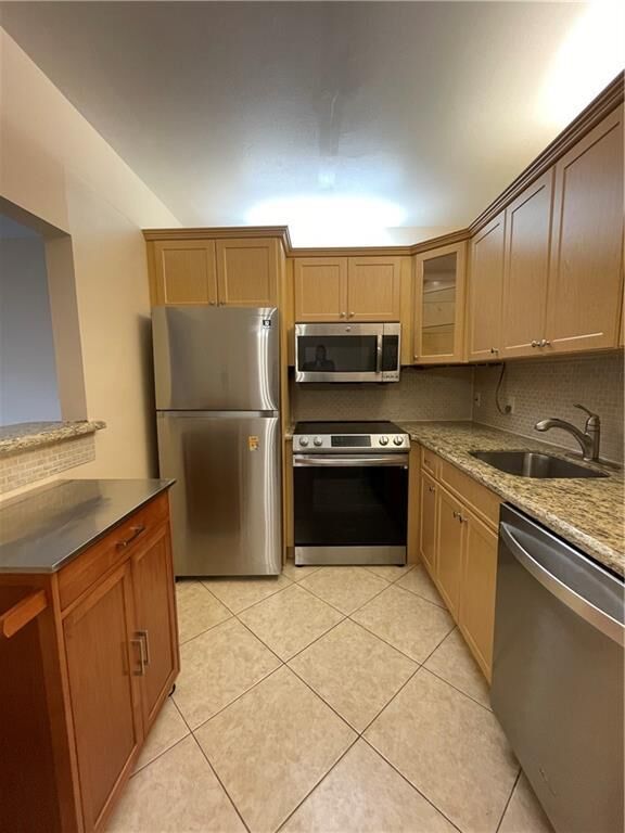 Property Photo:  255 Suffolk G 255  FL 33434 