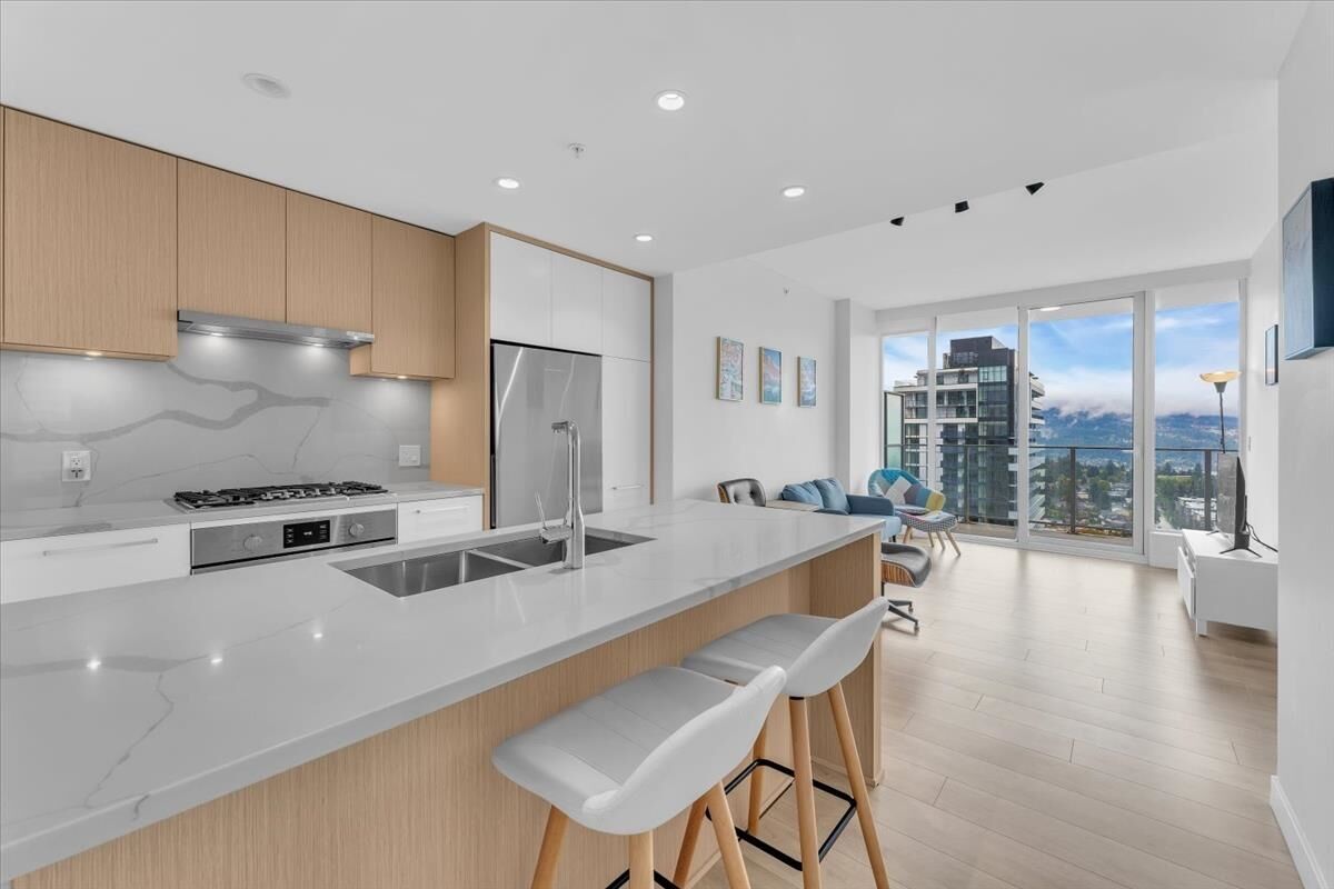 Property Photo: 567 Clarke Road 3305 BC V3J 0K7