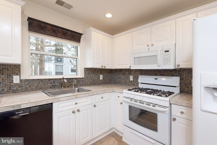 Property Photo:  20575 Snowshoe Square 202  VA 20147 