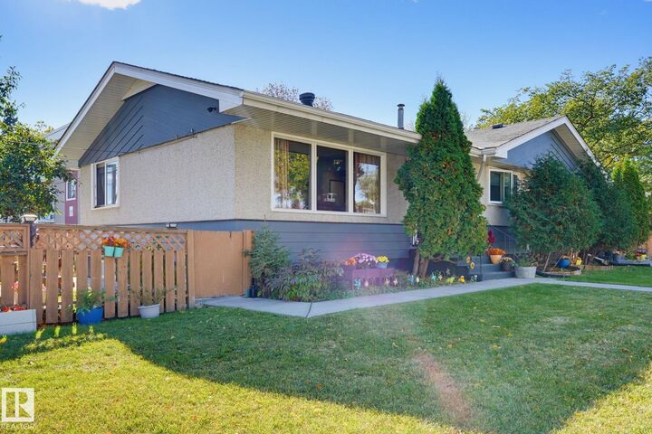 Property Photo:  10207 & 10209 120 Avenue NW  AB T5G 0S3 