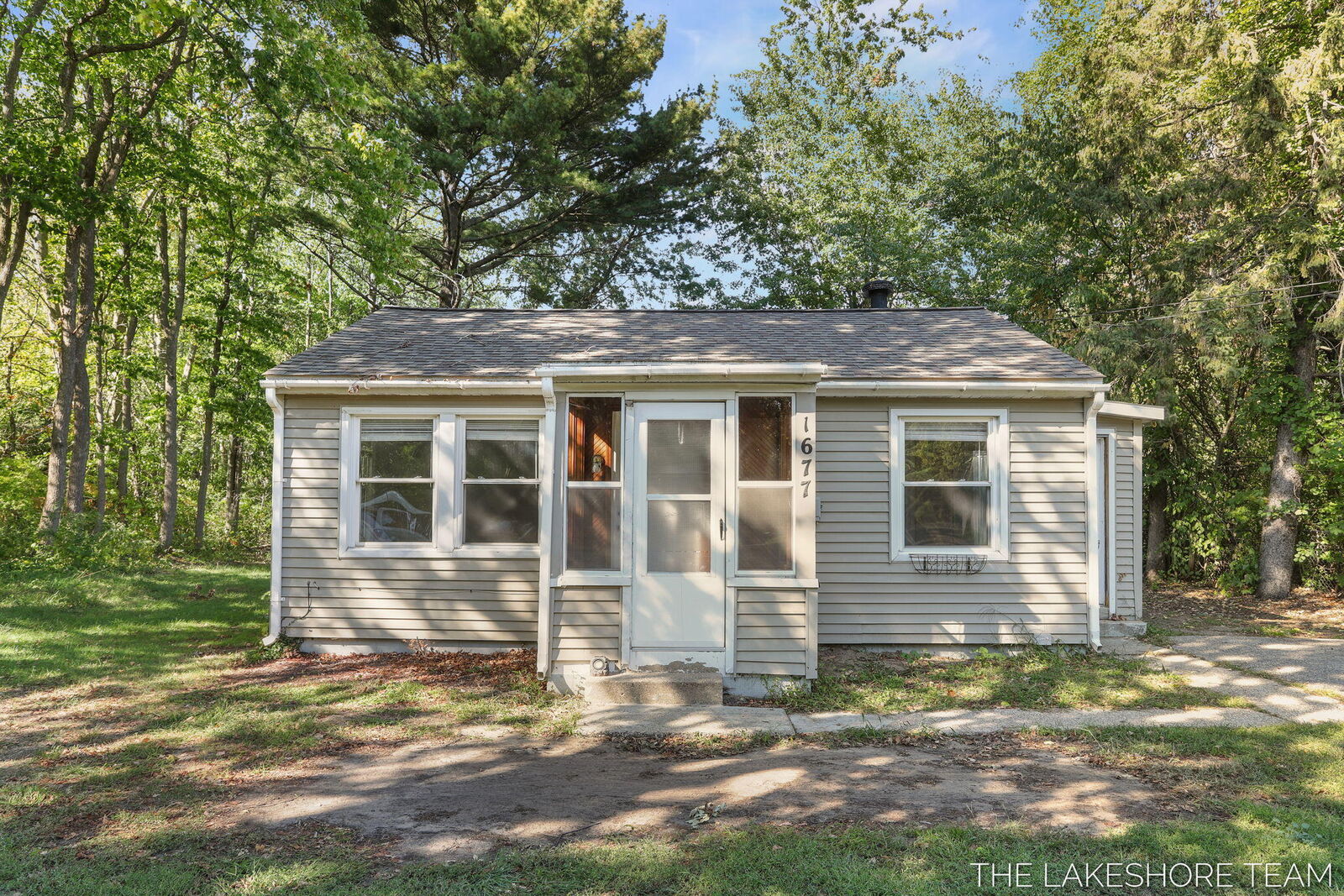 Property Photo:  1677 W Lakewood Boulevard  MI 49424 