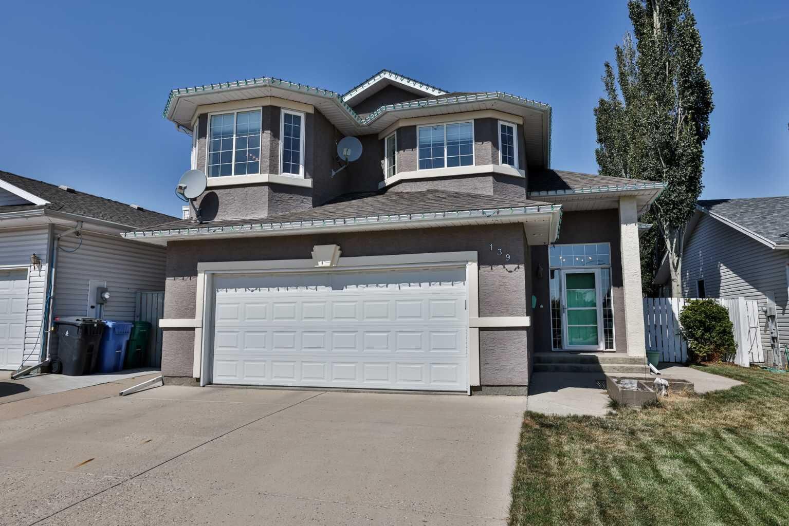 Property Photo:  139 Heritage Circle W  AB T1K 7K5 