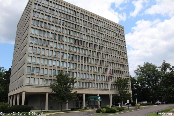 Property Photo: 22700 Garrison Street 1004 MI 48124