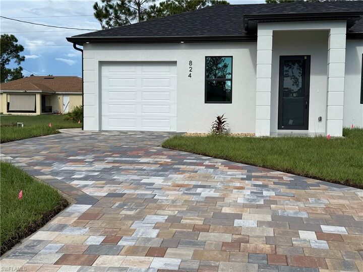 Property Photo:  824 Dawhert Ave S  FL 33974 