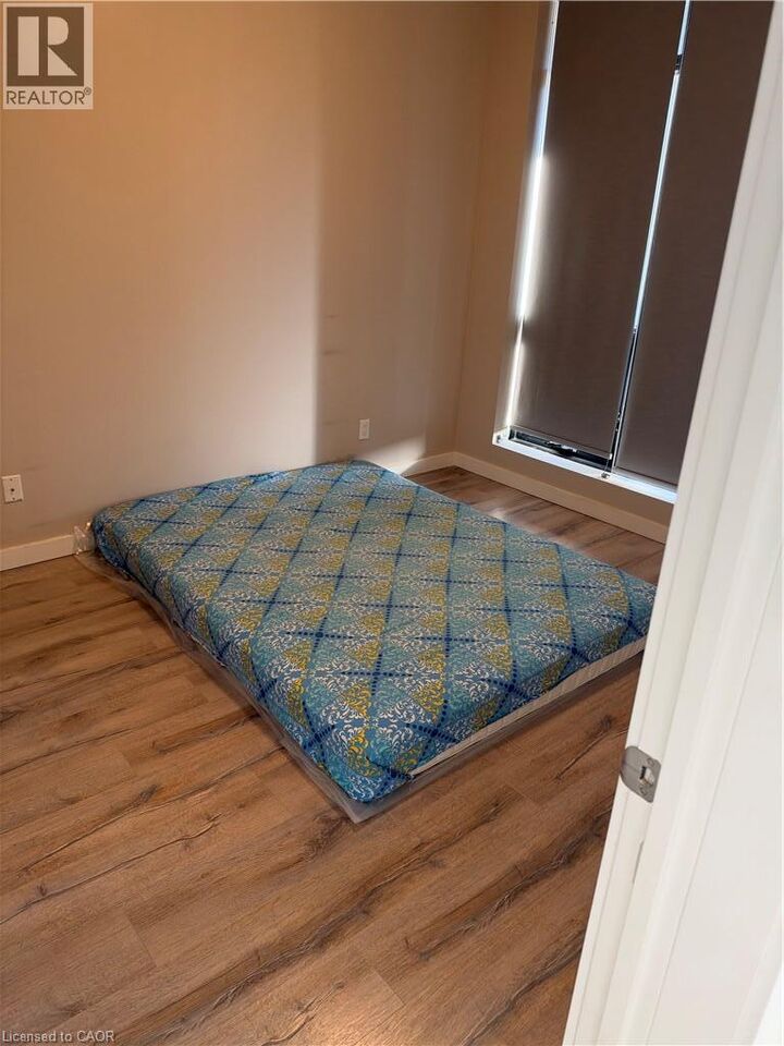 Property Photo:  690 King Street West 214  ON N2G 0B9 