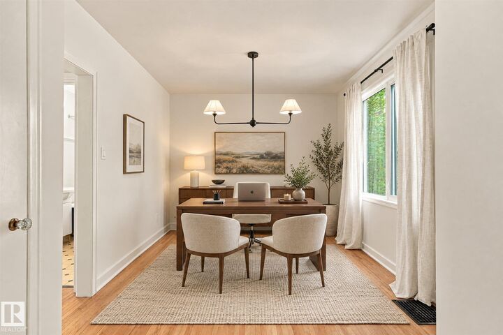 Property Photo:  11718 129 Street NW  AB T5M 0Y7 