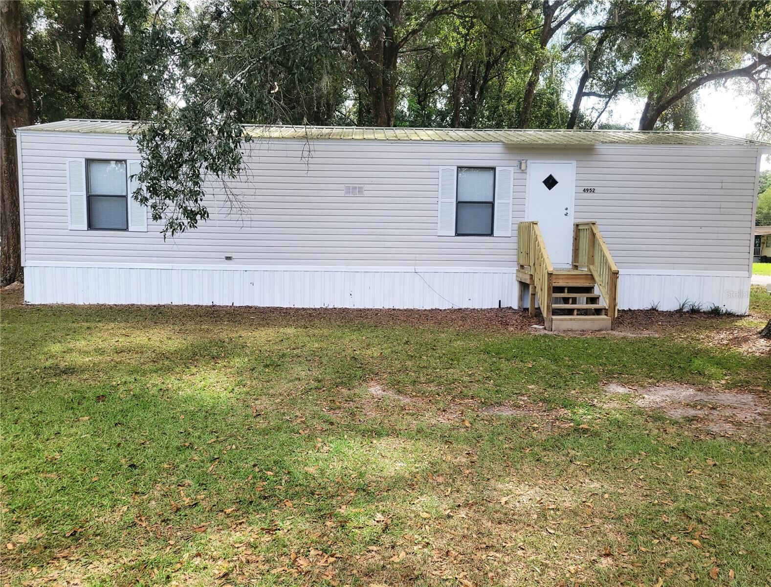 Property Photo:  4952 SE 145th Street  FL 34491 