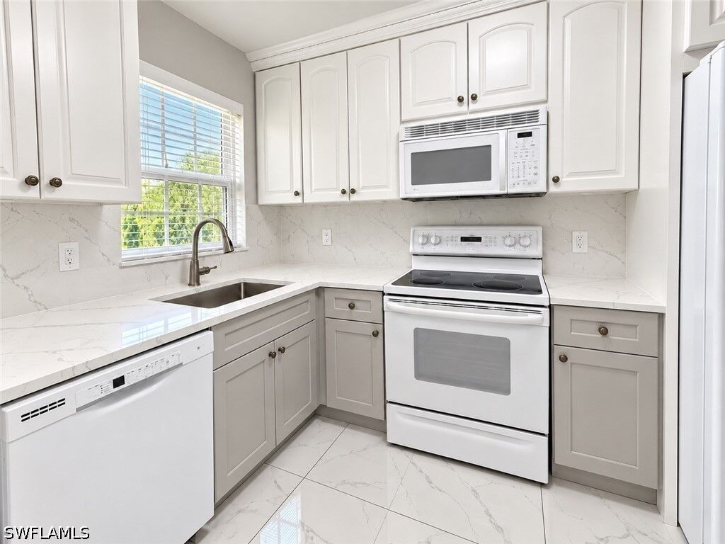Property Photo:  501 Forest Lakes Boulevard 212  FL 34105 