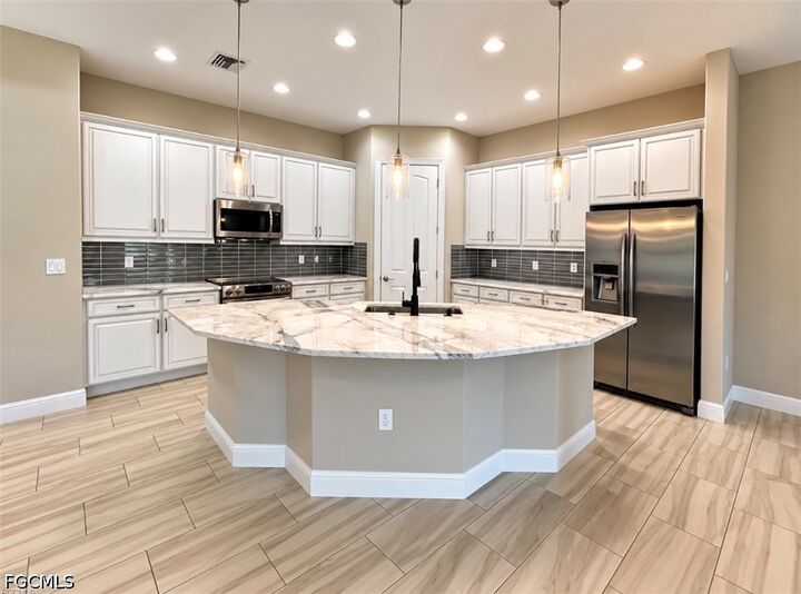 Property Photo:  12725 Astor Place  FL 33913 