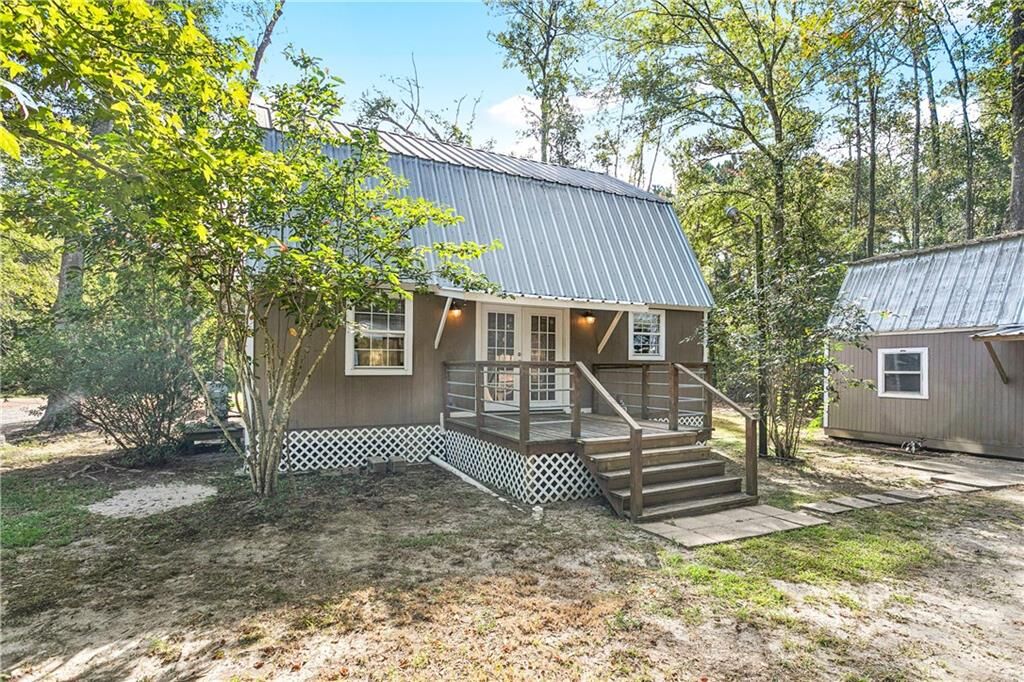 Property Photo:  73211 Plantation Street A  LA 70435 