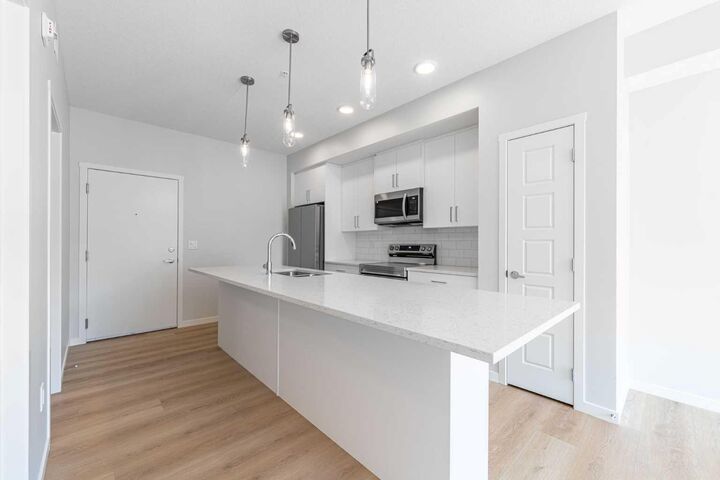 Property Photo:  20295 Seton Way SE 5413  AB T3M 3Y9 