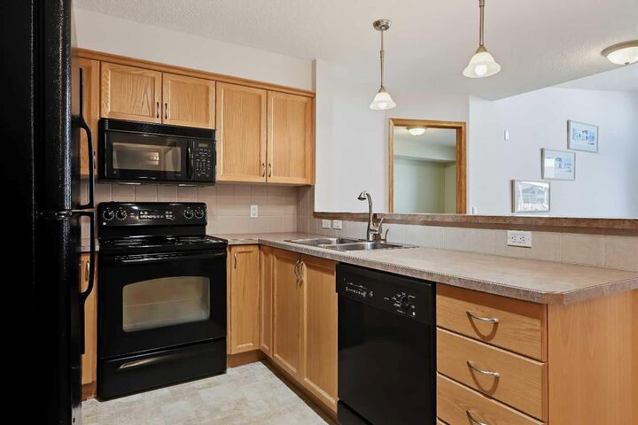 Property Photo:  380 Marina Drive 313  AB T1X 0B8 