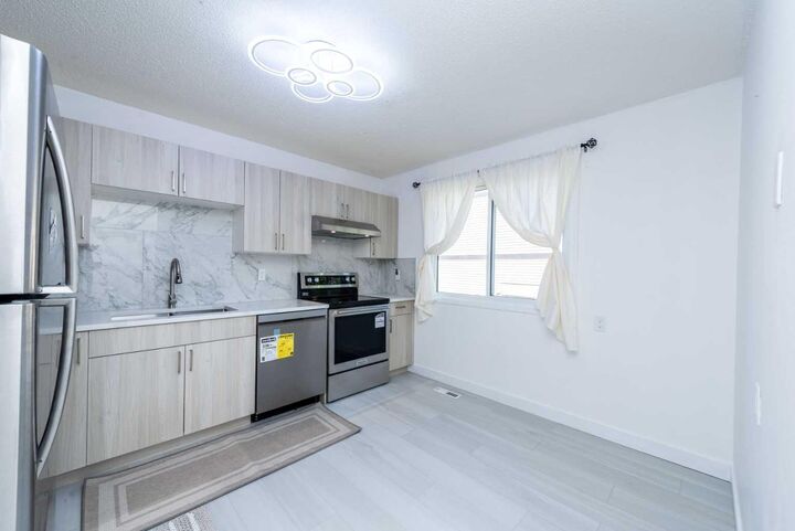 Property Photo:  3029 Rundleson Road NE 34  AB T1Y 3Z5 