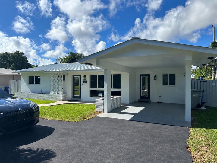 Property Photo:  613 NE 25th Avenue  FL 33062 